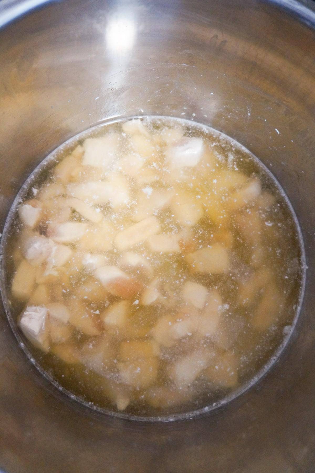 chicken breast chunks in broth in an Instant Pot 
