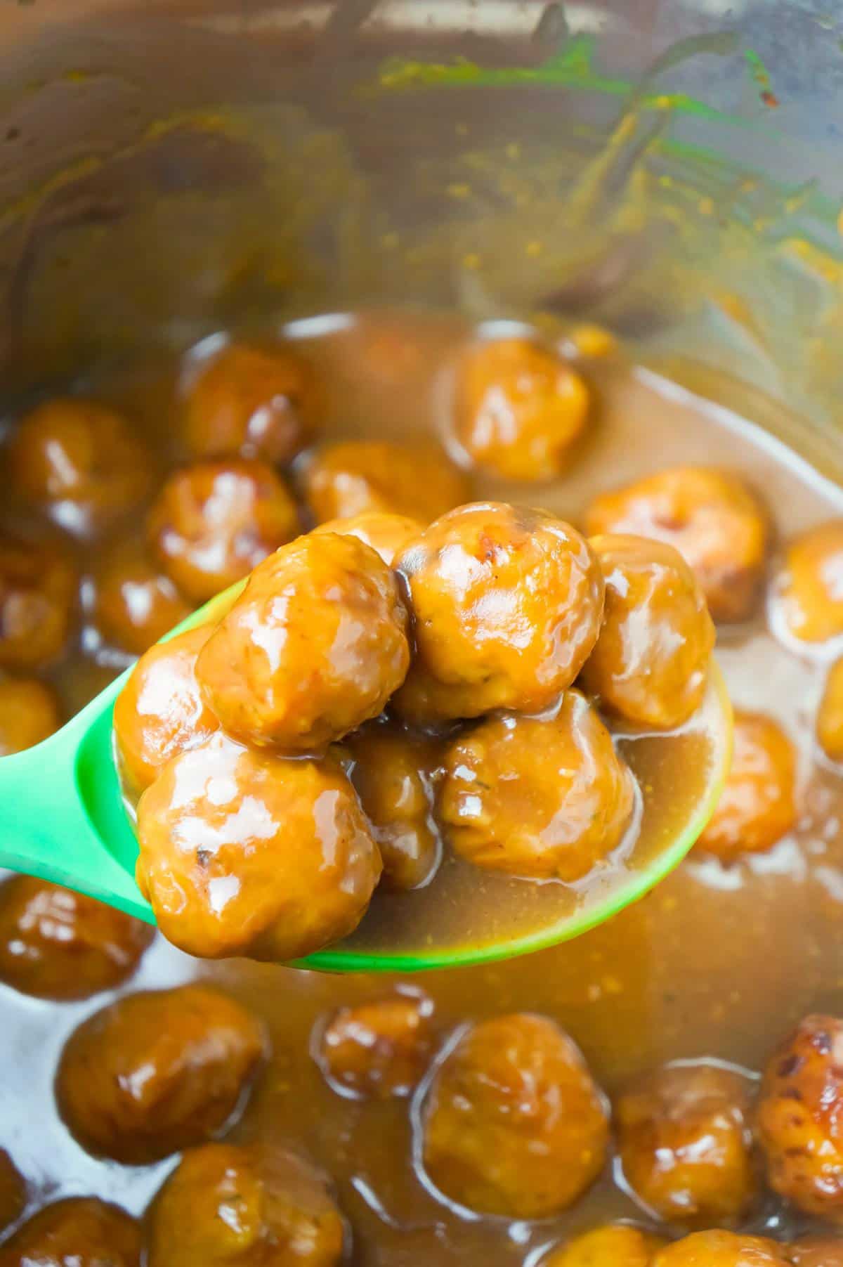 Instant Pot Cranberry Mustard Turkey Meatballs are a delicious party food recipe made with frozen turkey meatballs, jellied cranberry sauce, yellow mustard and liquid honey.