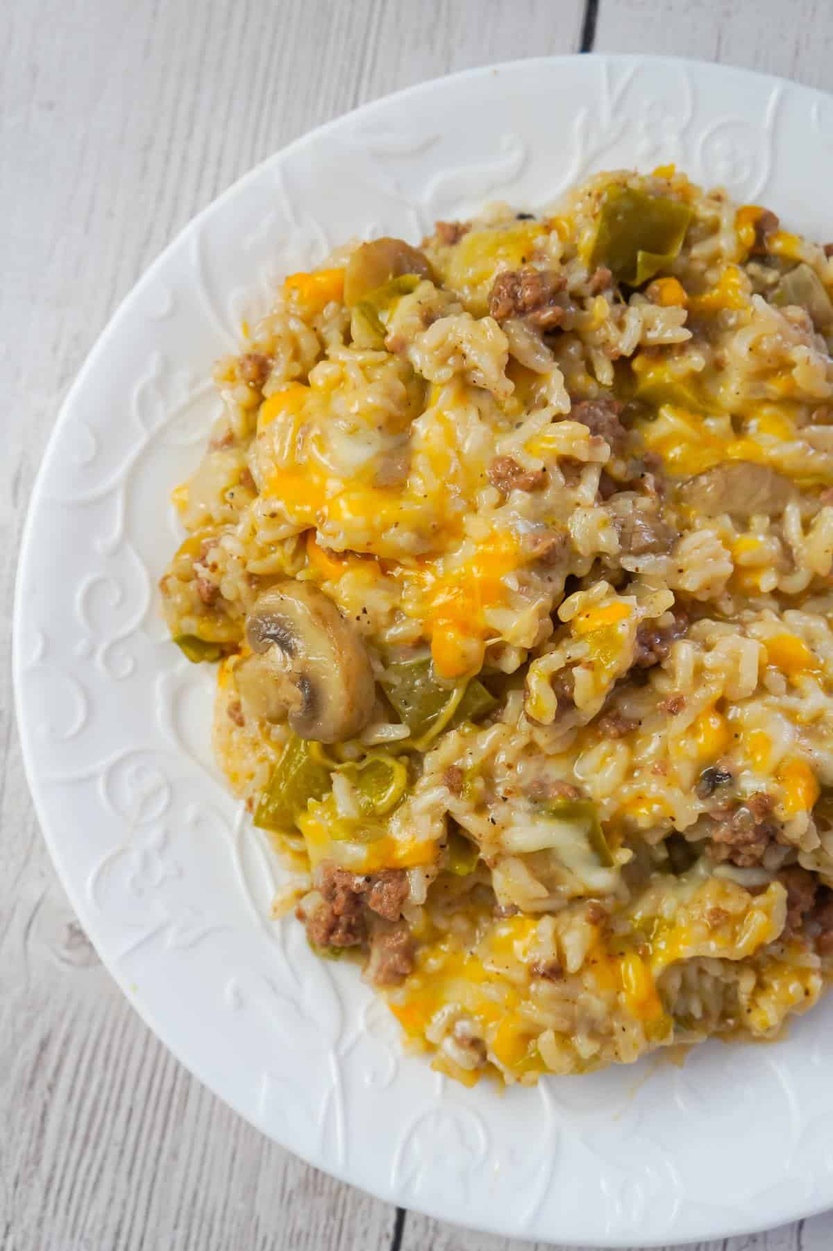 Instant Pot Philly Cheese Steak Ground Beef and Rice is an easy ground beef dinner recipe loaded with long grain white rice, green peppers, onions, mushrooms and shredded cheese.