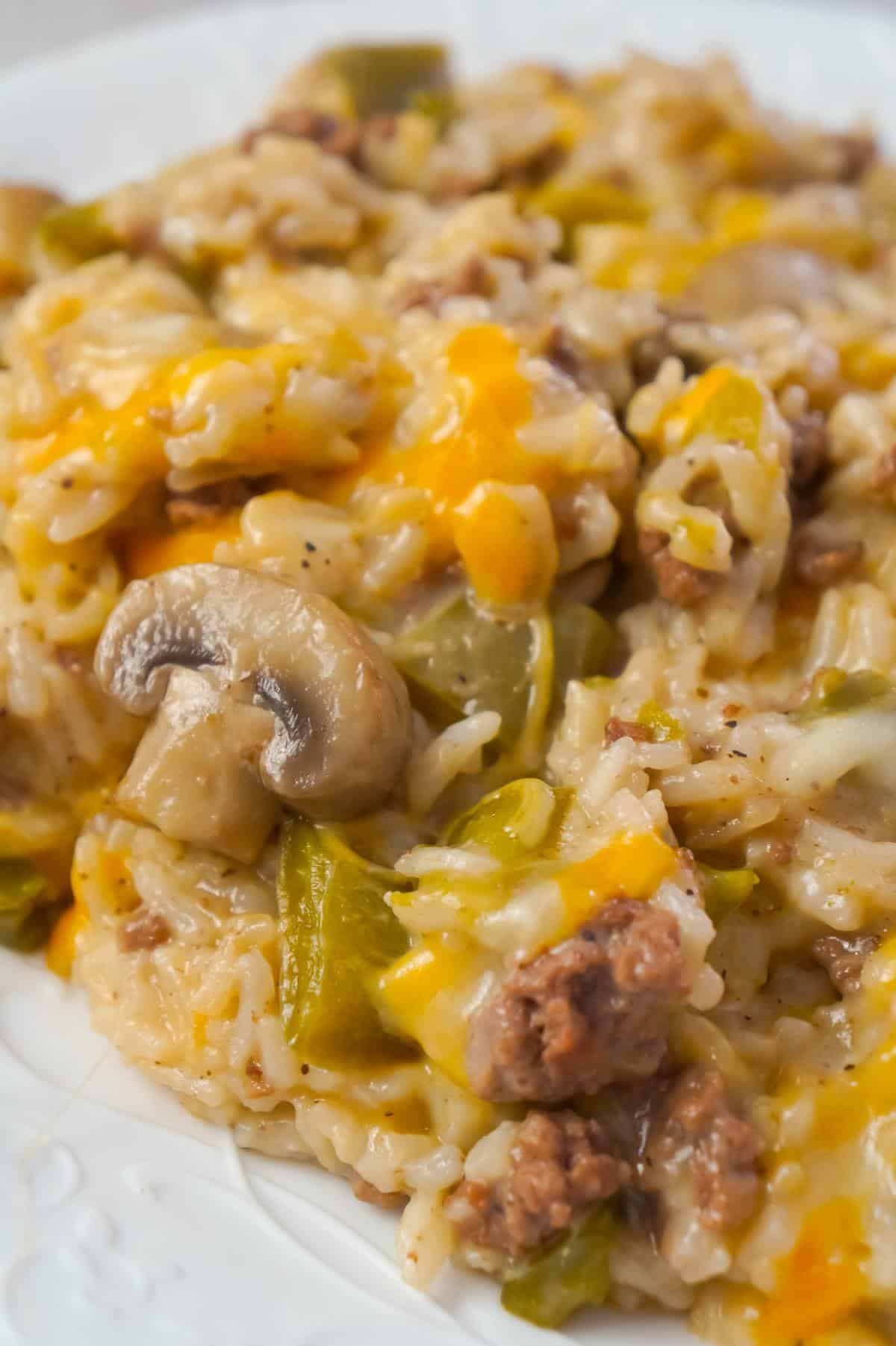 Instant Pot Philly Cheese Steak Ground Beef and Rice is an easy ground beef dinner recipe loaded with long grain white rice, green peppers, onions, mushrooms and shredded cheese.