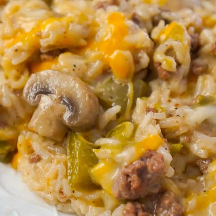 Instant Pot Philly Cheese Steak Ground Beef and Rice is an easy ground beef dinner recipe loaded with long grain white rice, green peppers, onions, mushrooms and shredded cheese.