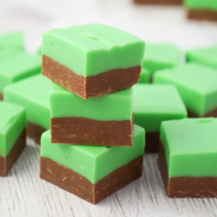Mint Chocolate Fudge is an easy microwave fudge recipe using sweetened condensed milk, milk chocolate chips, white chocolate chips, green food colouring and mint extract.