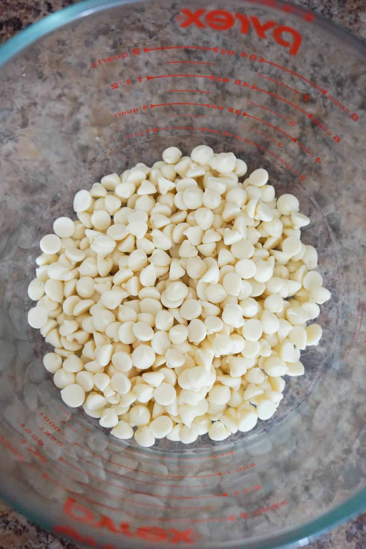 white chocolate chips in a glass bowl