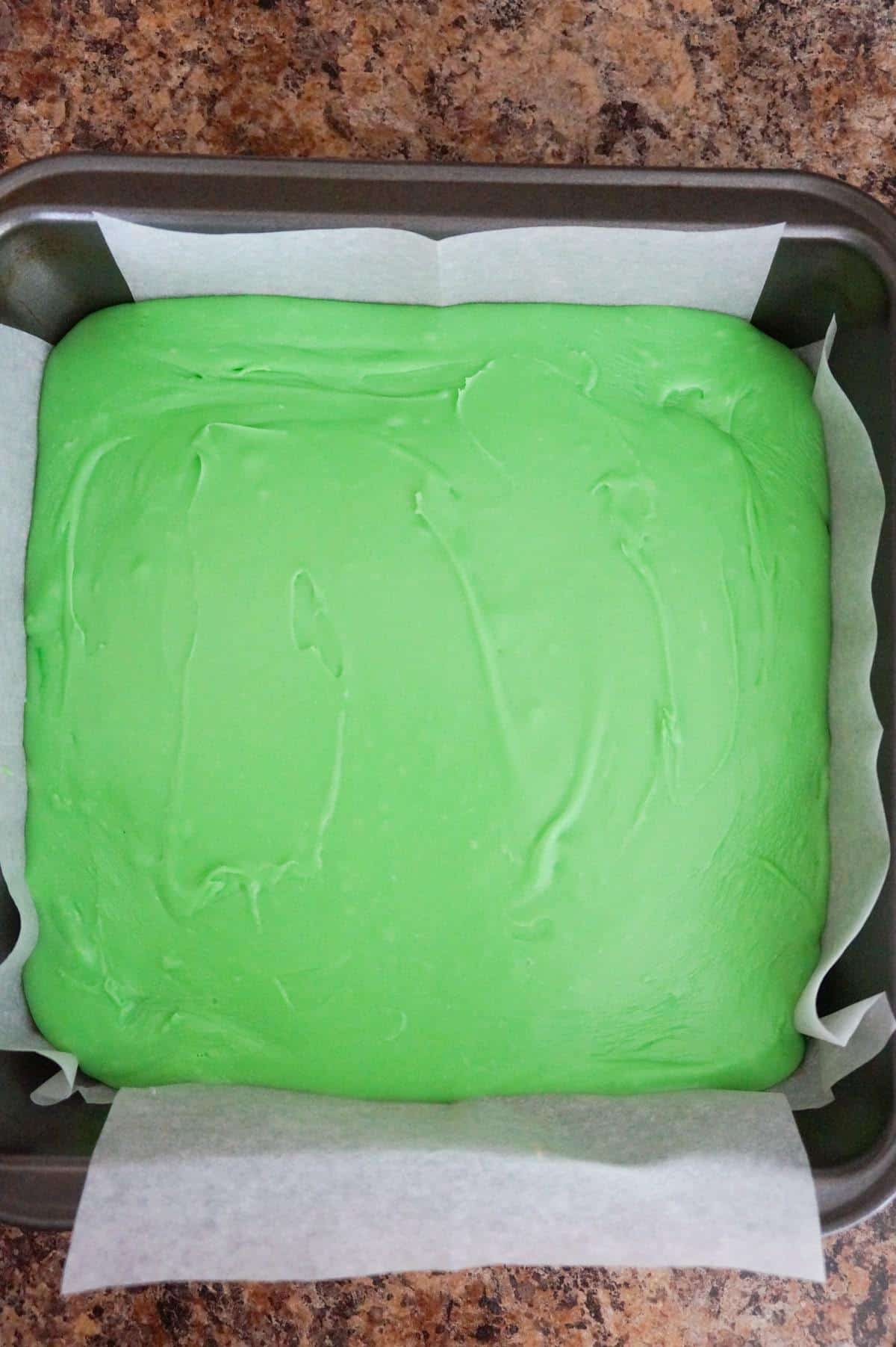 Mint Chocolate Fudge is an easy microwave fudge recipe using sweetened condensed milk, milk chocolate chips, white chocolate chips, green food colouring and mint extract.