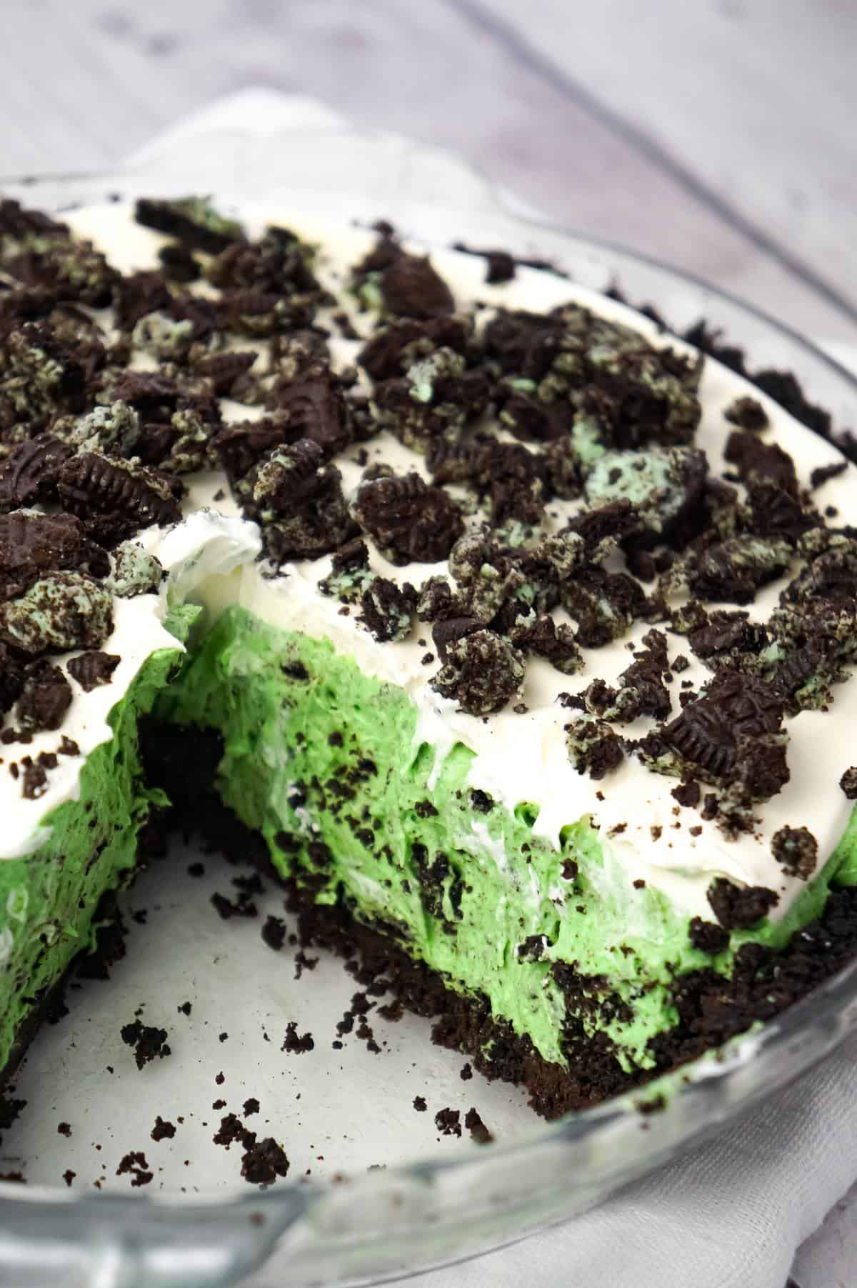 Mint Oreo Pie is an easy no bake dessert recipe with a creamy mint Oreo pudding filling, topped with Cool Whip, all in an Oreo crust.