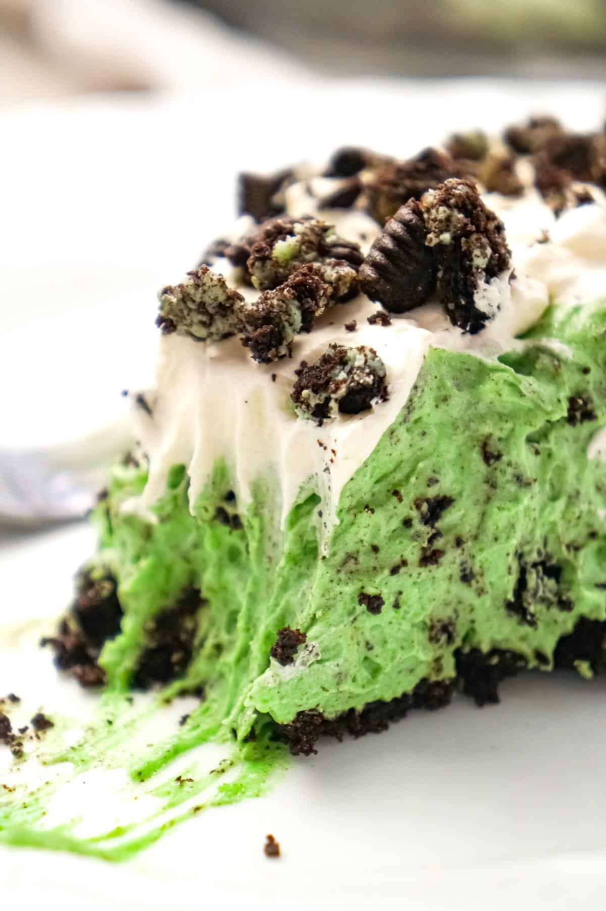 Mint Oreo Pie is an easy no bake dessert recipe with a creamy mint Oreo pudding filling, topped with Cool Whip, all in an Oreo crust.