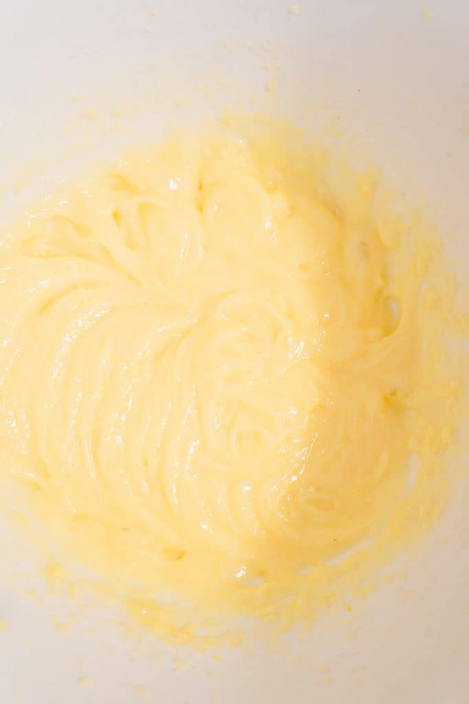 vanilla pudding mixture in a mixing bowl