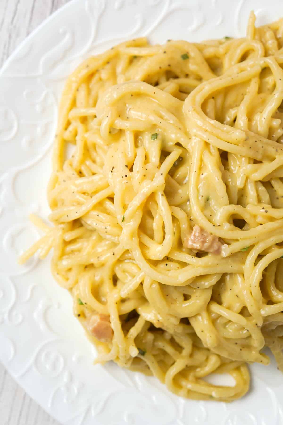 One Pot Chicken Spaghetti is an easy dinner recipe using just spaghetti noodles, condensed cream of chicken soup and spices.