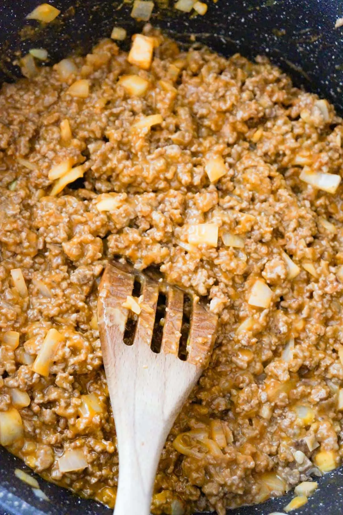 ground beef and cheese soup mixture in a saute pan