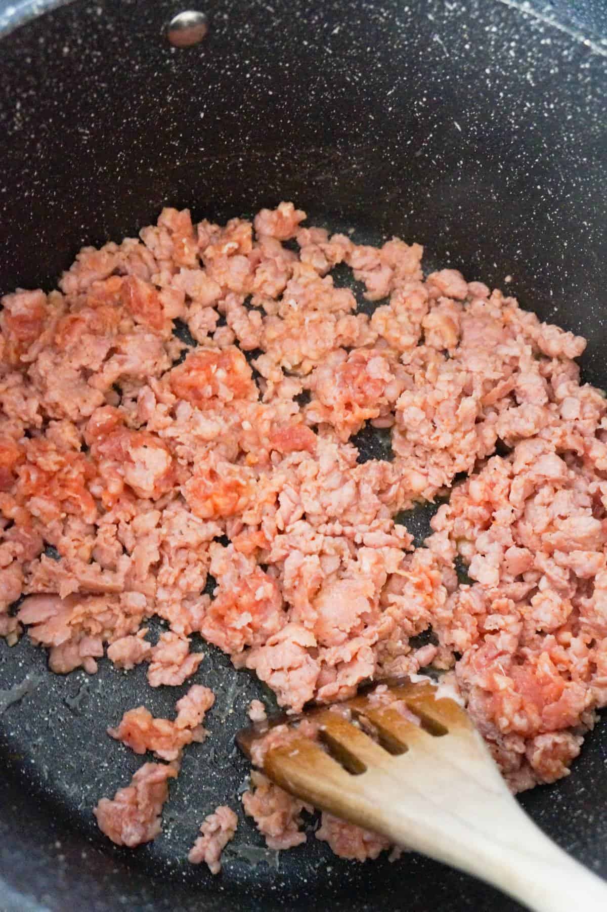 ground sausage meat cooking in a pot