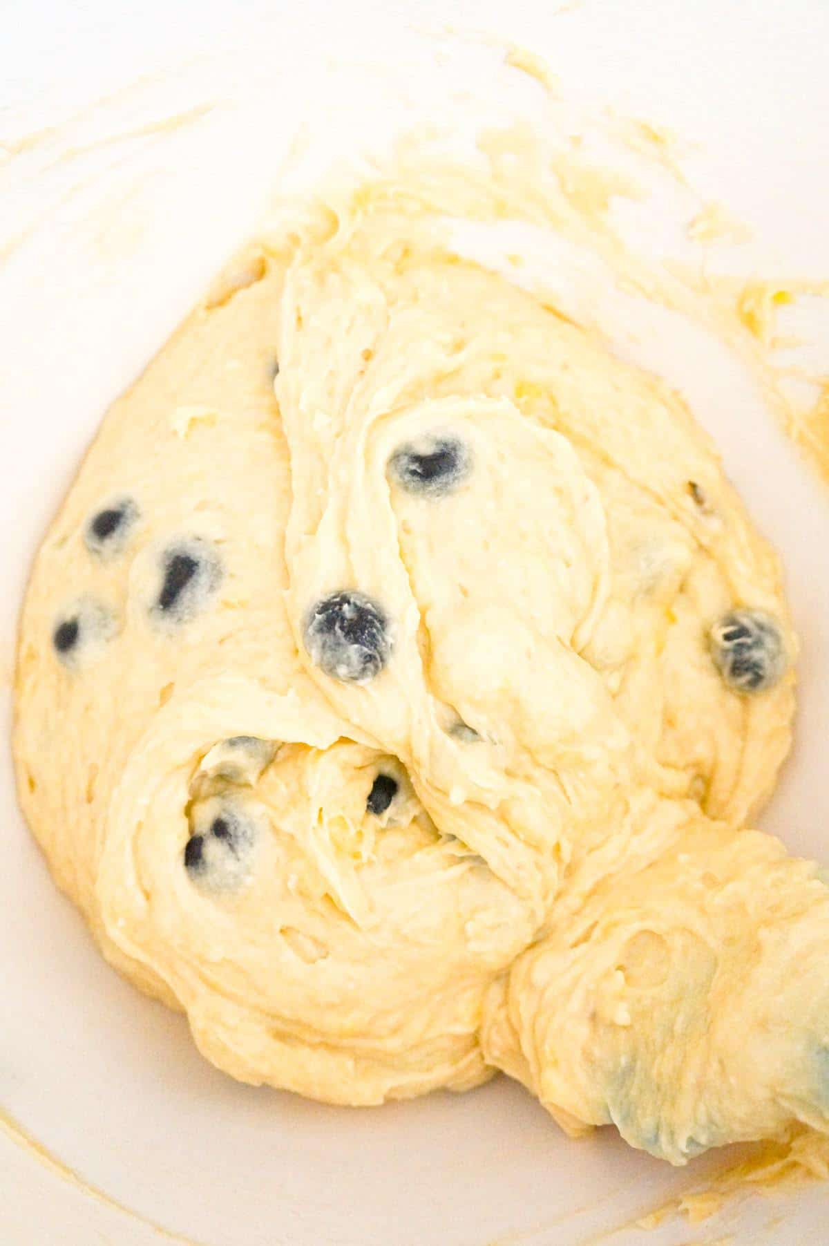 blueberry banana bread batter in a mixing bowl