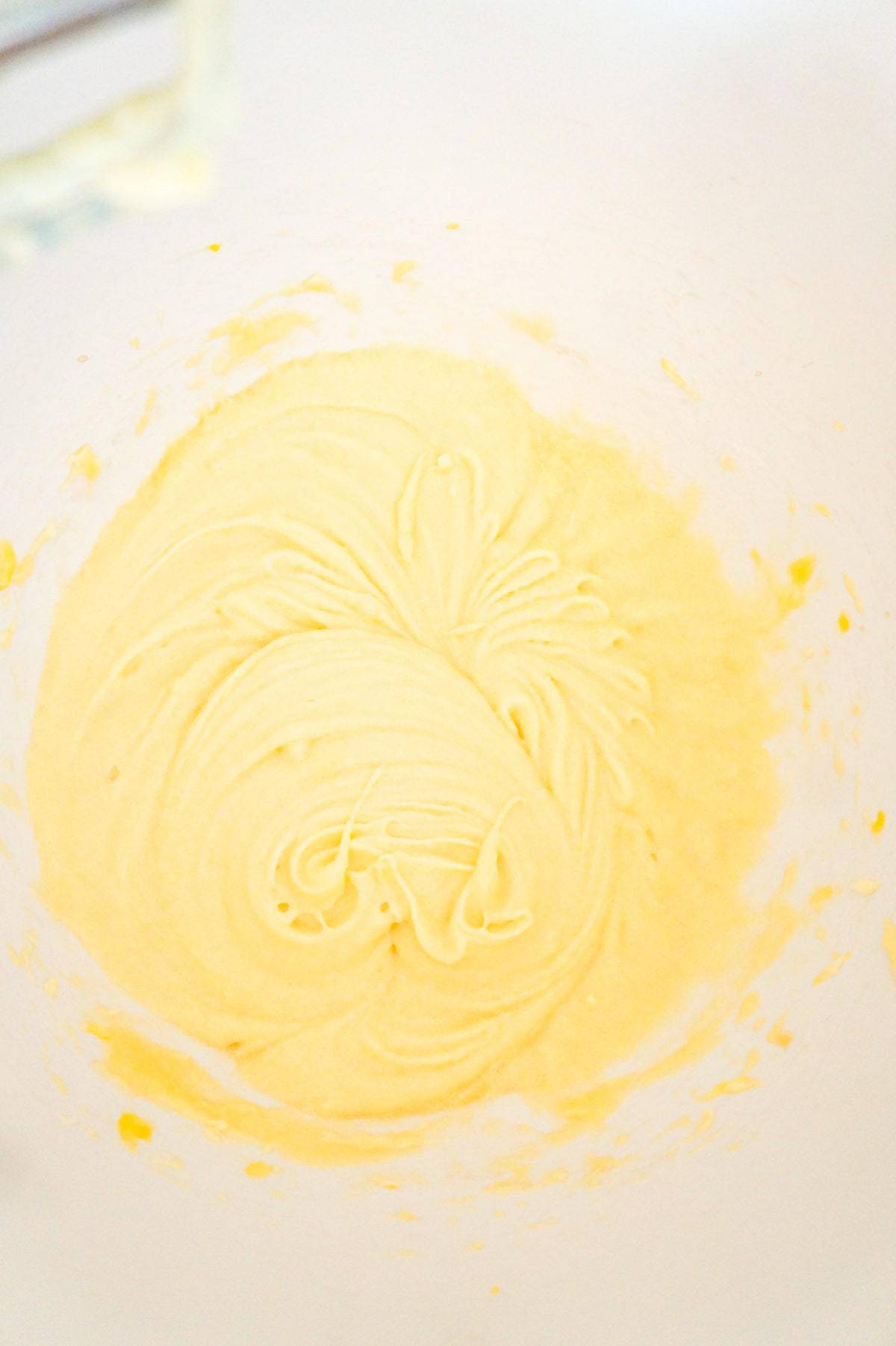 creamed butter and sugar mixture in a mixing bowl