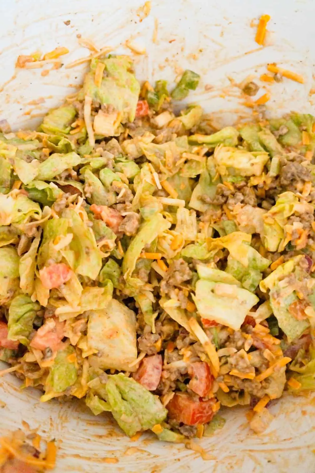 beef taco salad in a mixing bowl