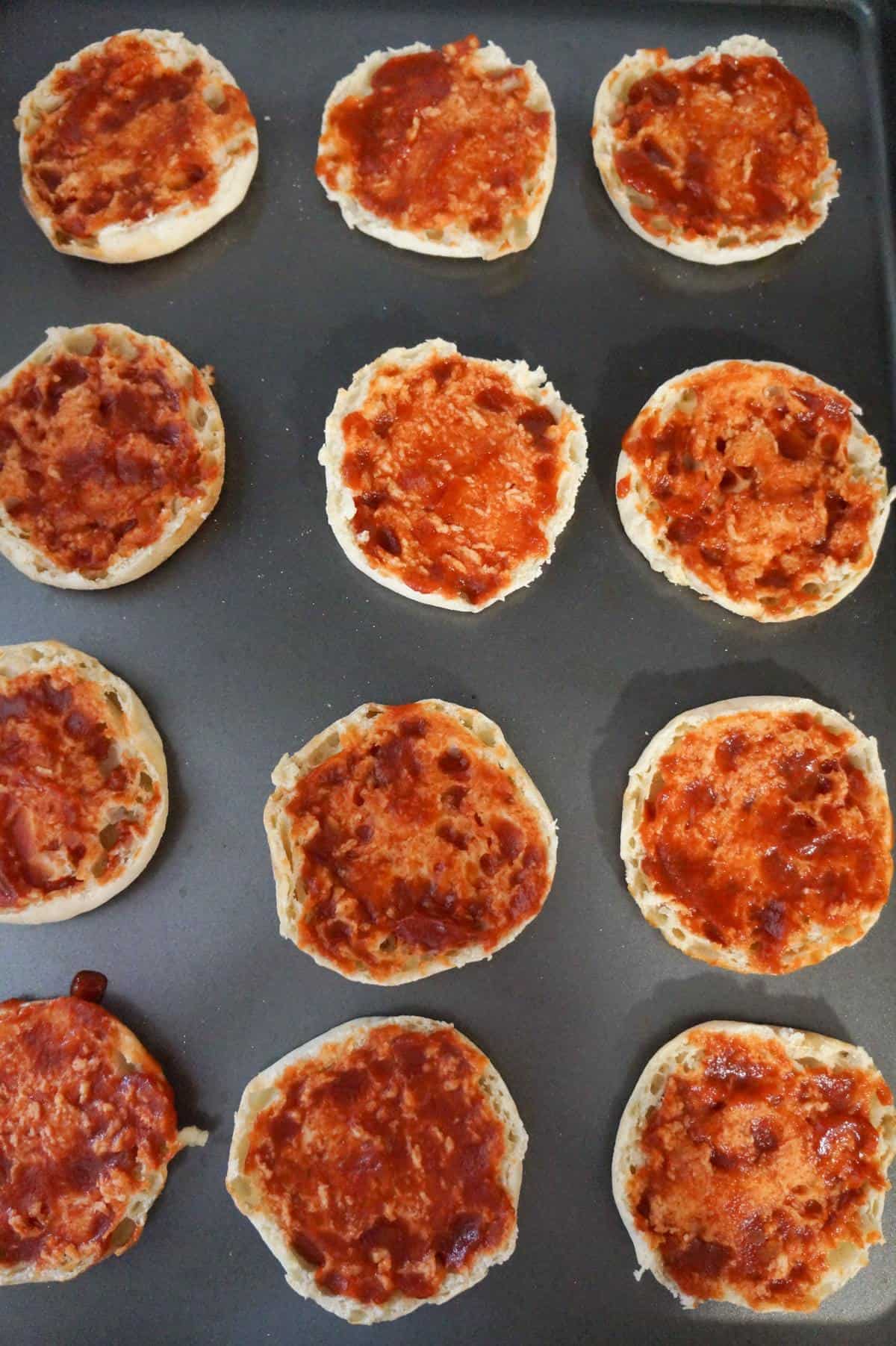 English muffins spread with Heinz chili sauce