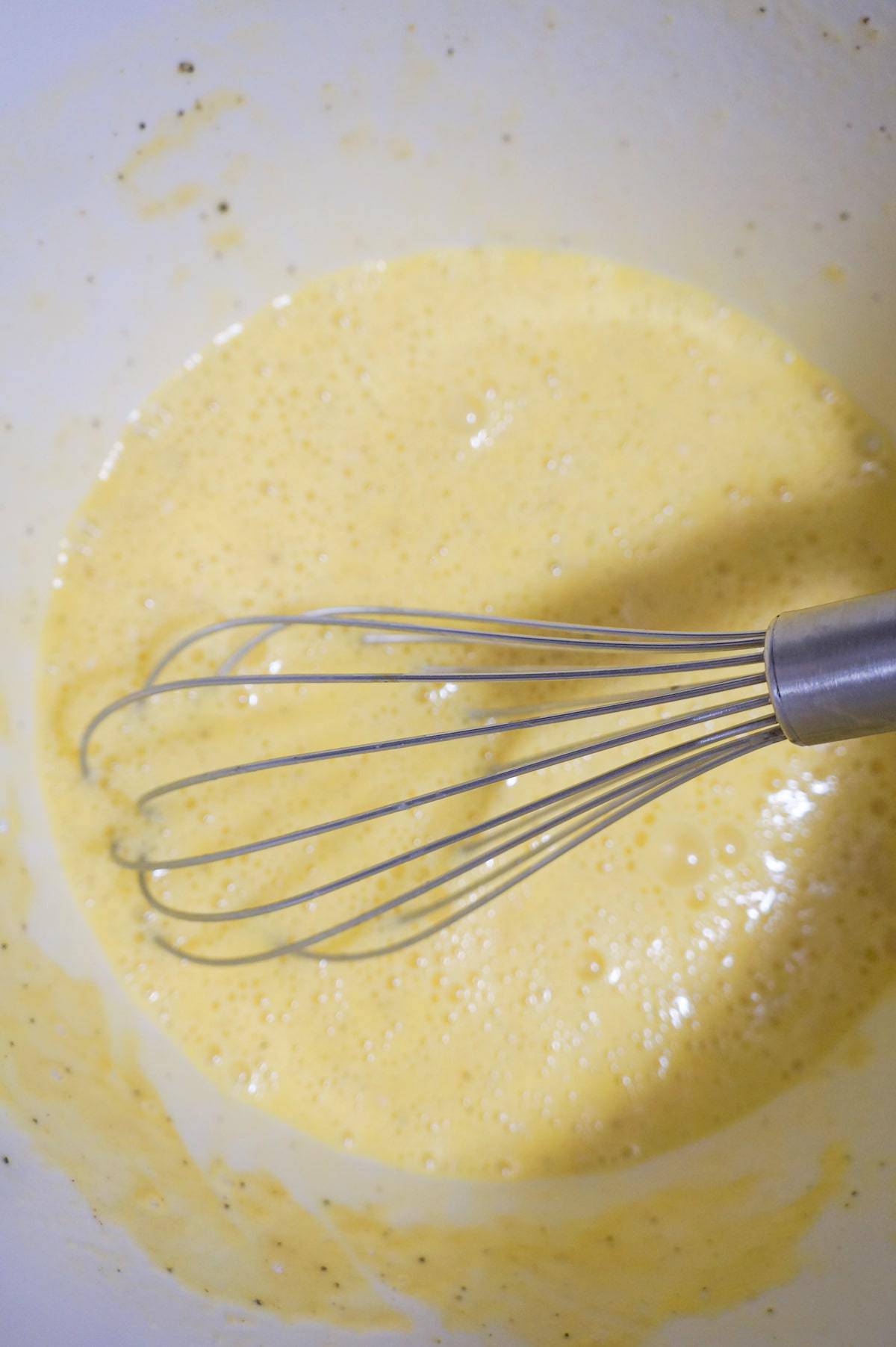 beaten eggs in a mixing bowl