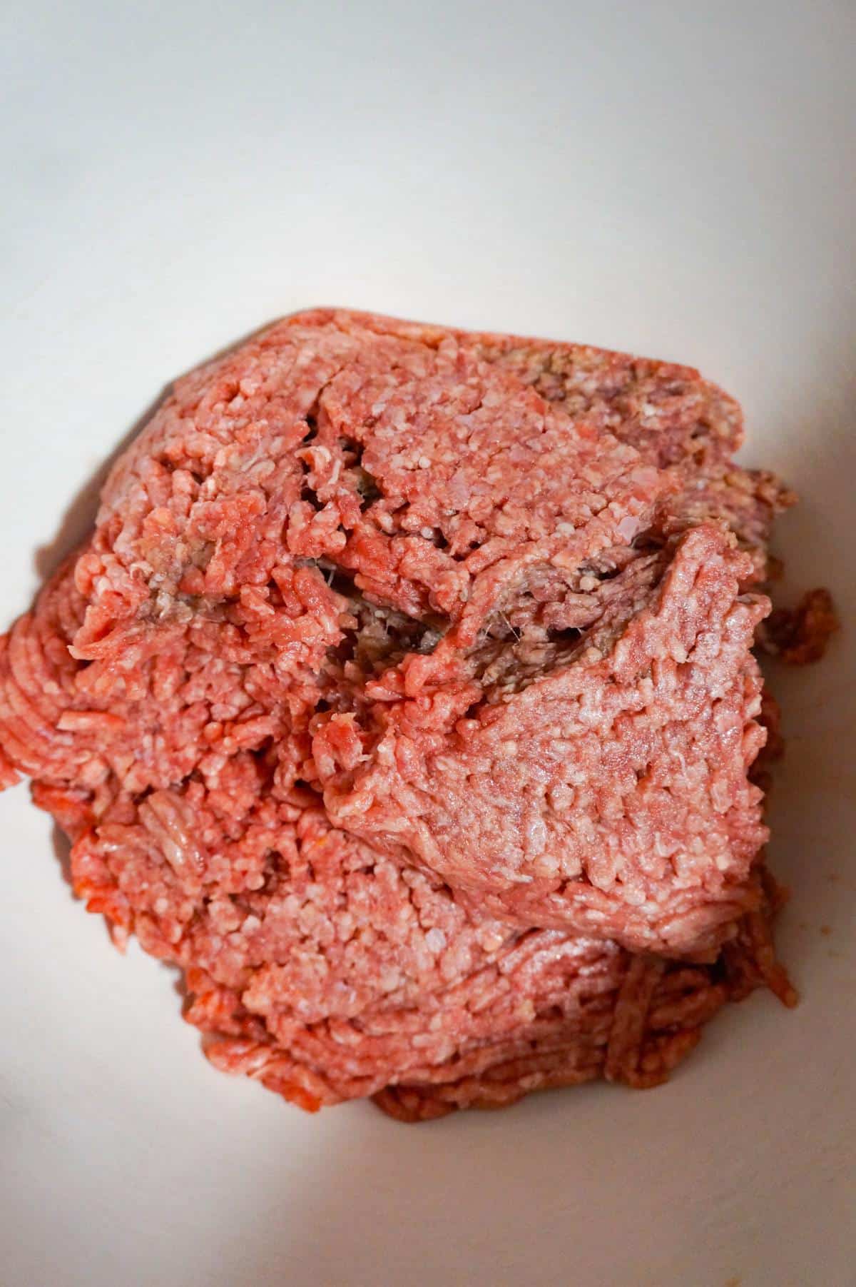 lean ground beef in a mixing bowl