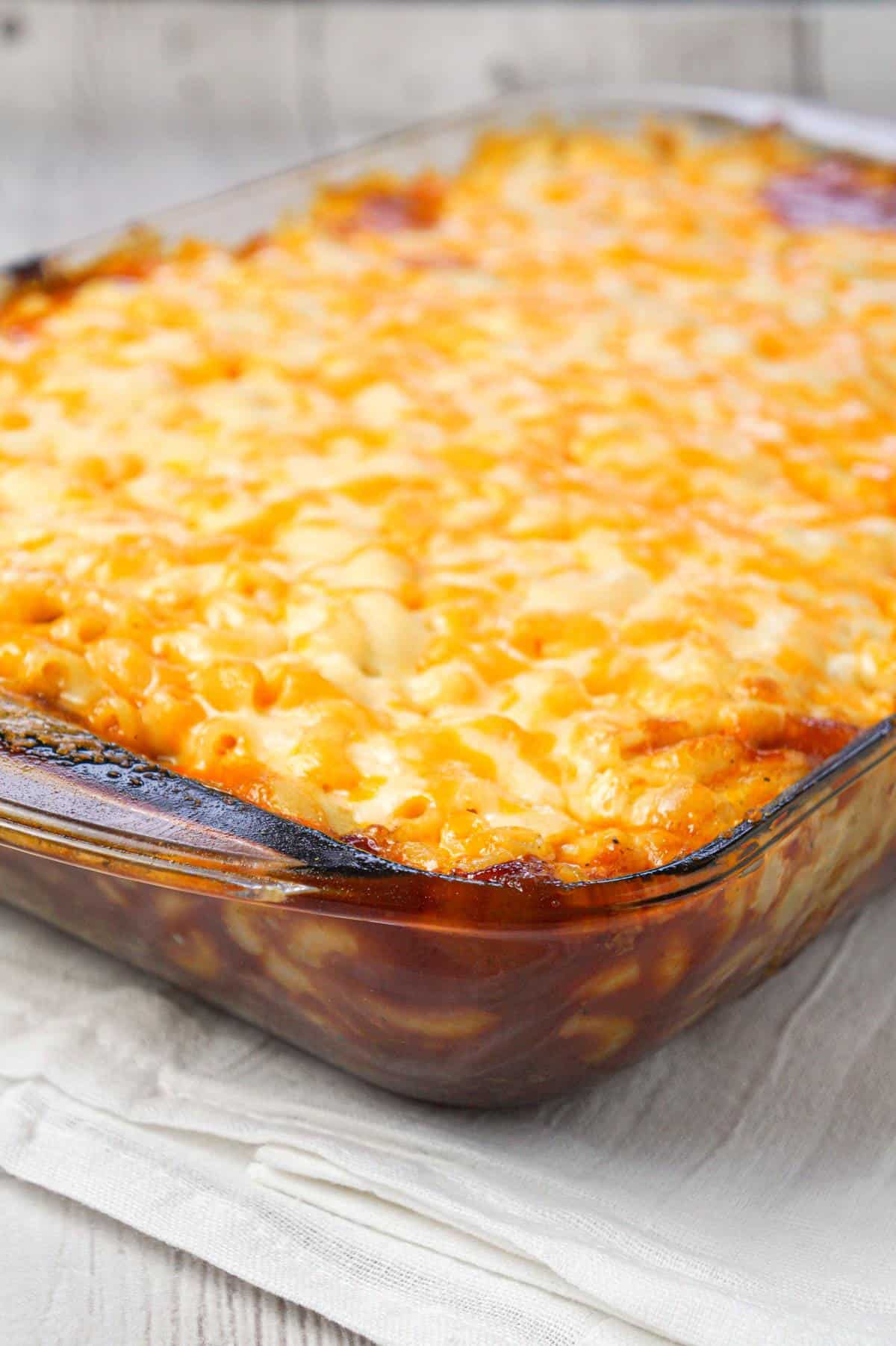 Mac and Cheese Meatloaf Casserole is a hearty dinner recipe with a ground beef meatloaf base with macaroni and cheese baked on top.