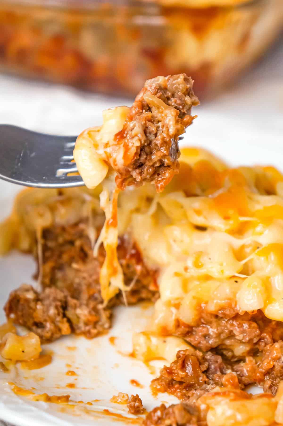 Mac and Cheese Meatloaf Casserole is a hearty dinner recipe with a ground beef meatloaf base with macaroni and cheese baked on top.