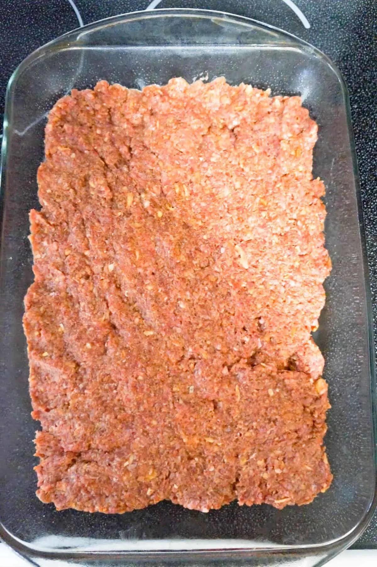meatloaf mixture in a baking dish