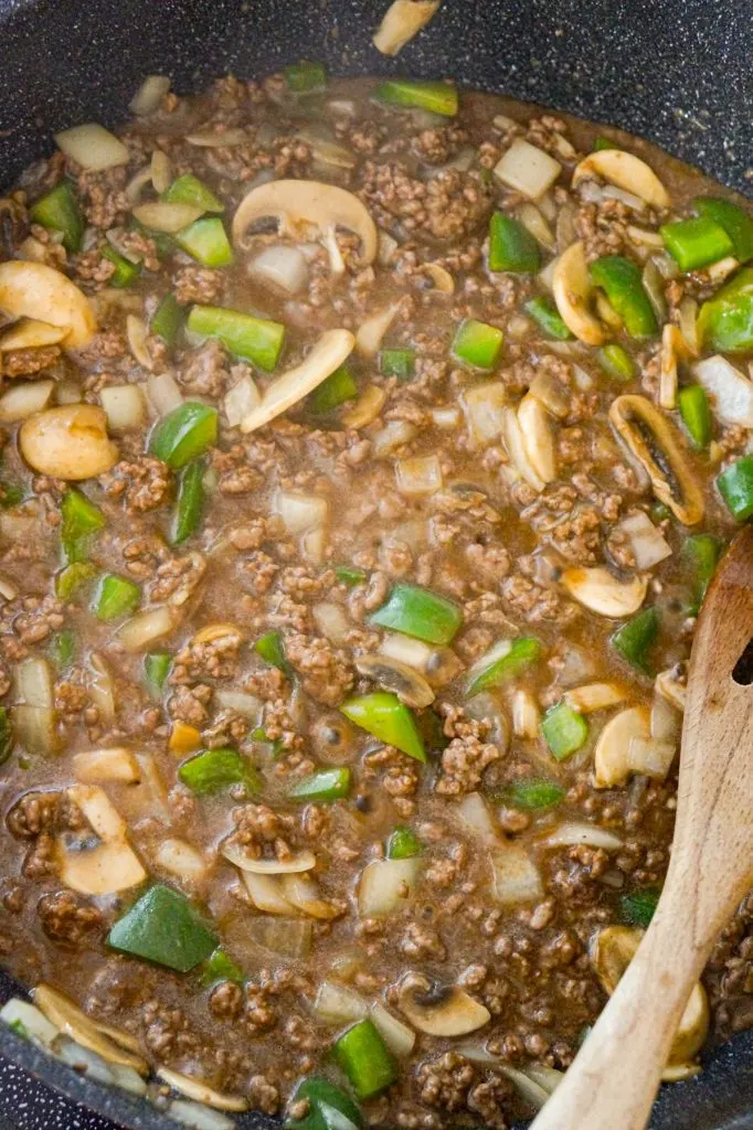 ground beef, diced green peppers and sliced mushrooms tossed in gravy