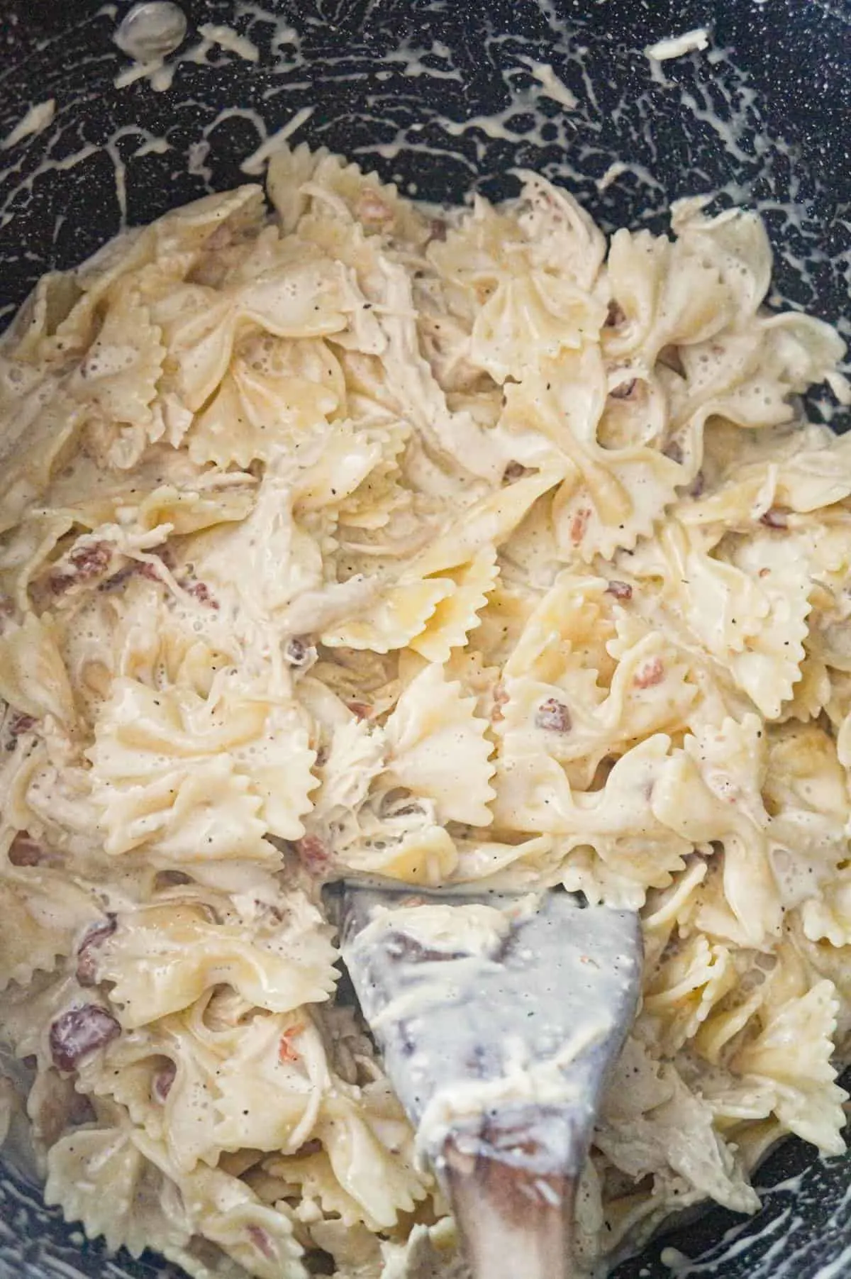 chicken Alfredo pasta in a large pot