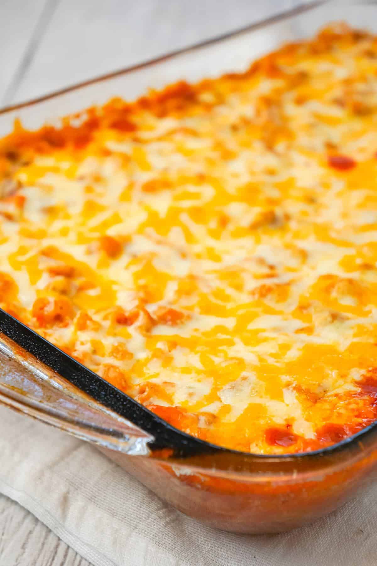 Baked Chili Mac and Cheese is an easy pasta recipe loaded with ground beef, tomato sauce, salsa and a shredded Tex Mex cheese blend.