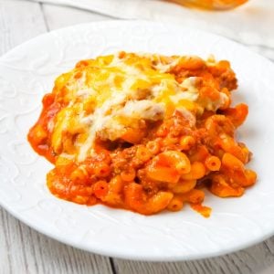 Baked Chili Mac and Cheese is an easy pasta recipe loaded with ground beef, tomato sauce, salsa and a shredded Tex Mex cheese blend.