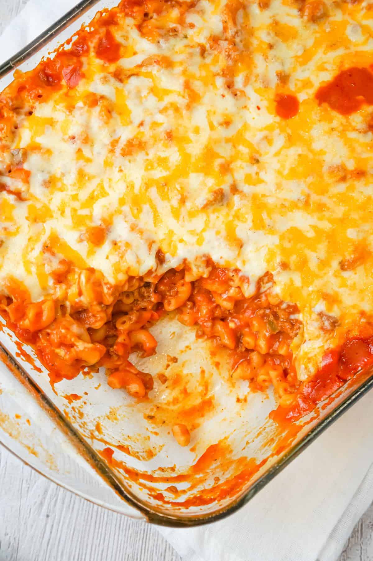 Baked Chili Mac and Cheese is an easy pasta recipe loaded with ground beef, tomato sauce, salsa and a shredded Tex Mex cheese blend.