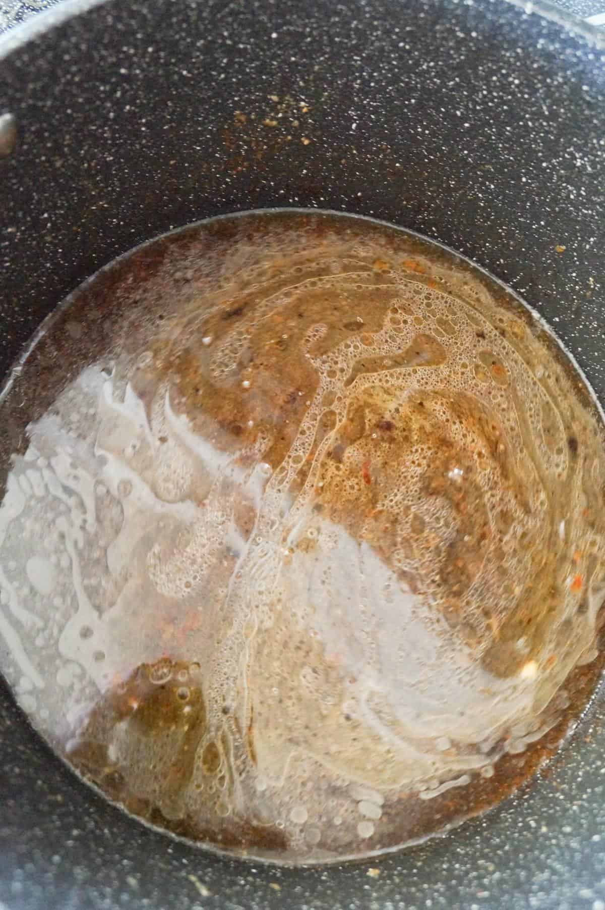 melted browned butter and water in a large pot