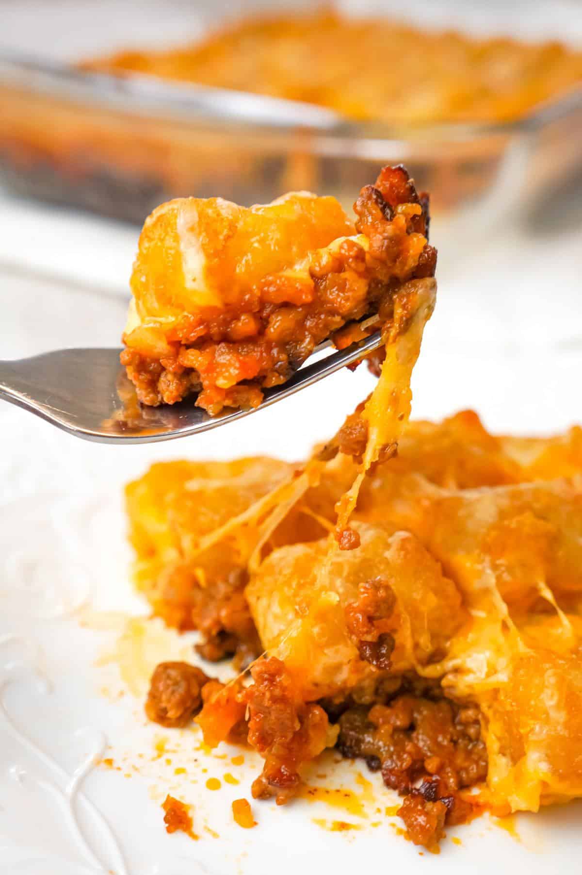 Sloppy Joe Tater Tot Casserole is an easy dinner recipe with a ground beef sloppy joe base, topped with cheese and tater tots.