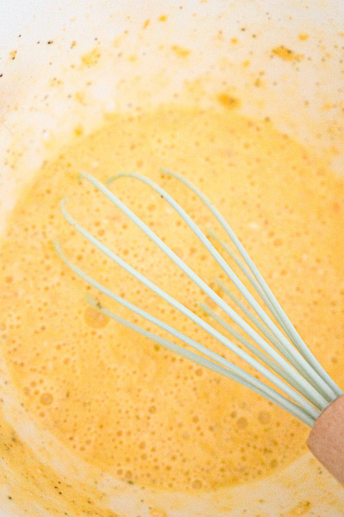 beaten egg mixture in a mixing bowl