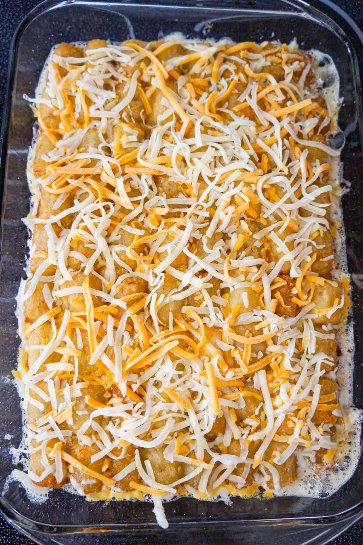 shredded cheese on top of tater tot casserole