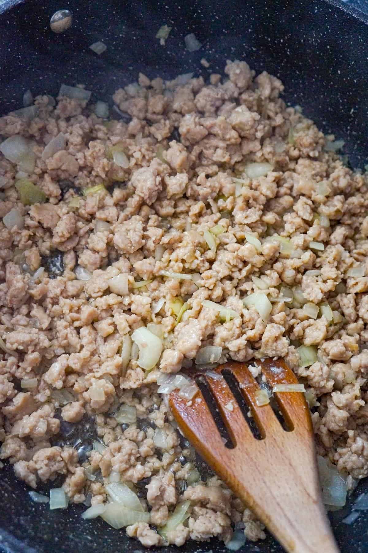 crumbled sausage meat in a saute pan