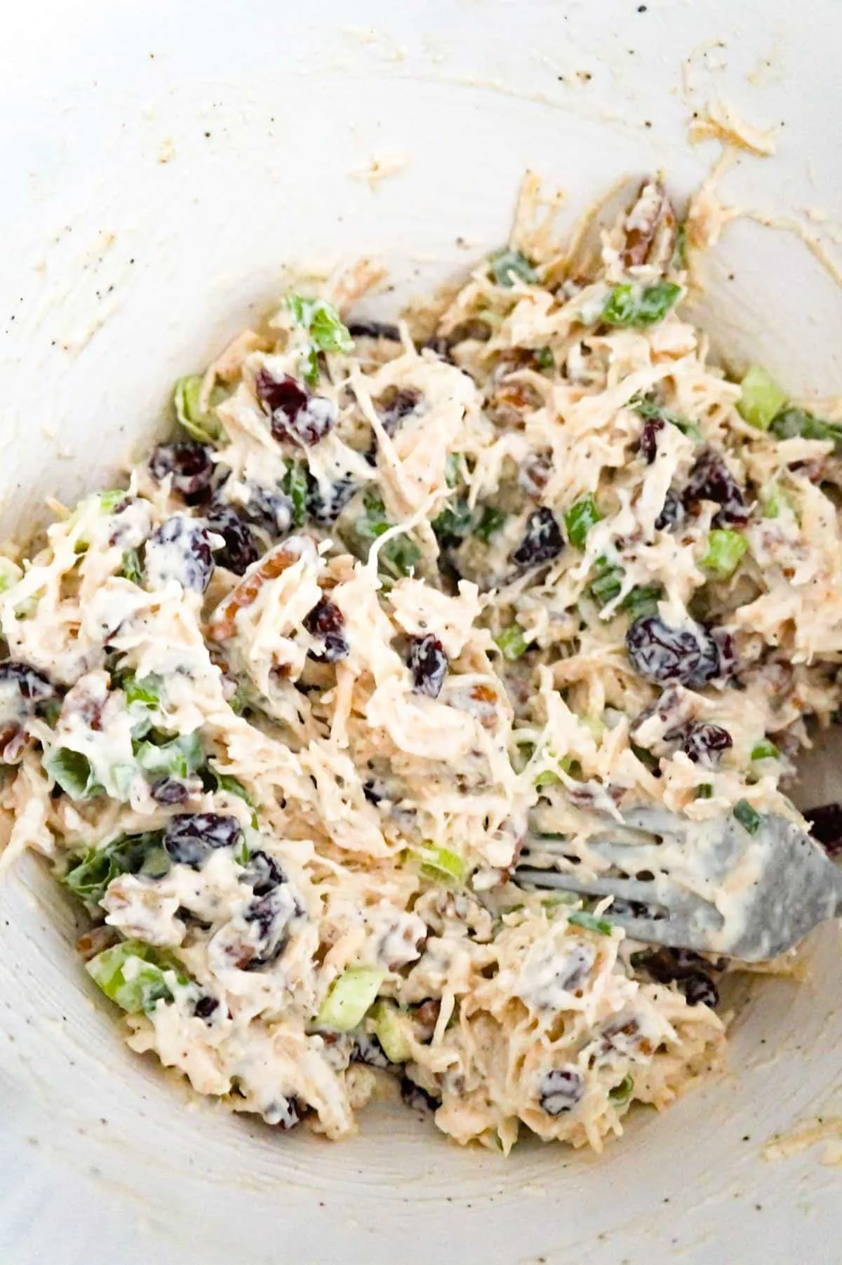 creamy chicken salad mixture in a mixing bowl