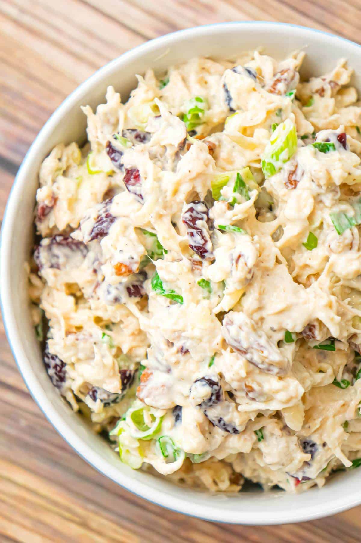 Chicken Salad with Cranberries is an easy cold lunch or dinner recipe using canned chicken and loaded with dried cranberries, chopped green onions, pecan pieces and shredded mozzarella cheese.