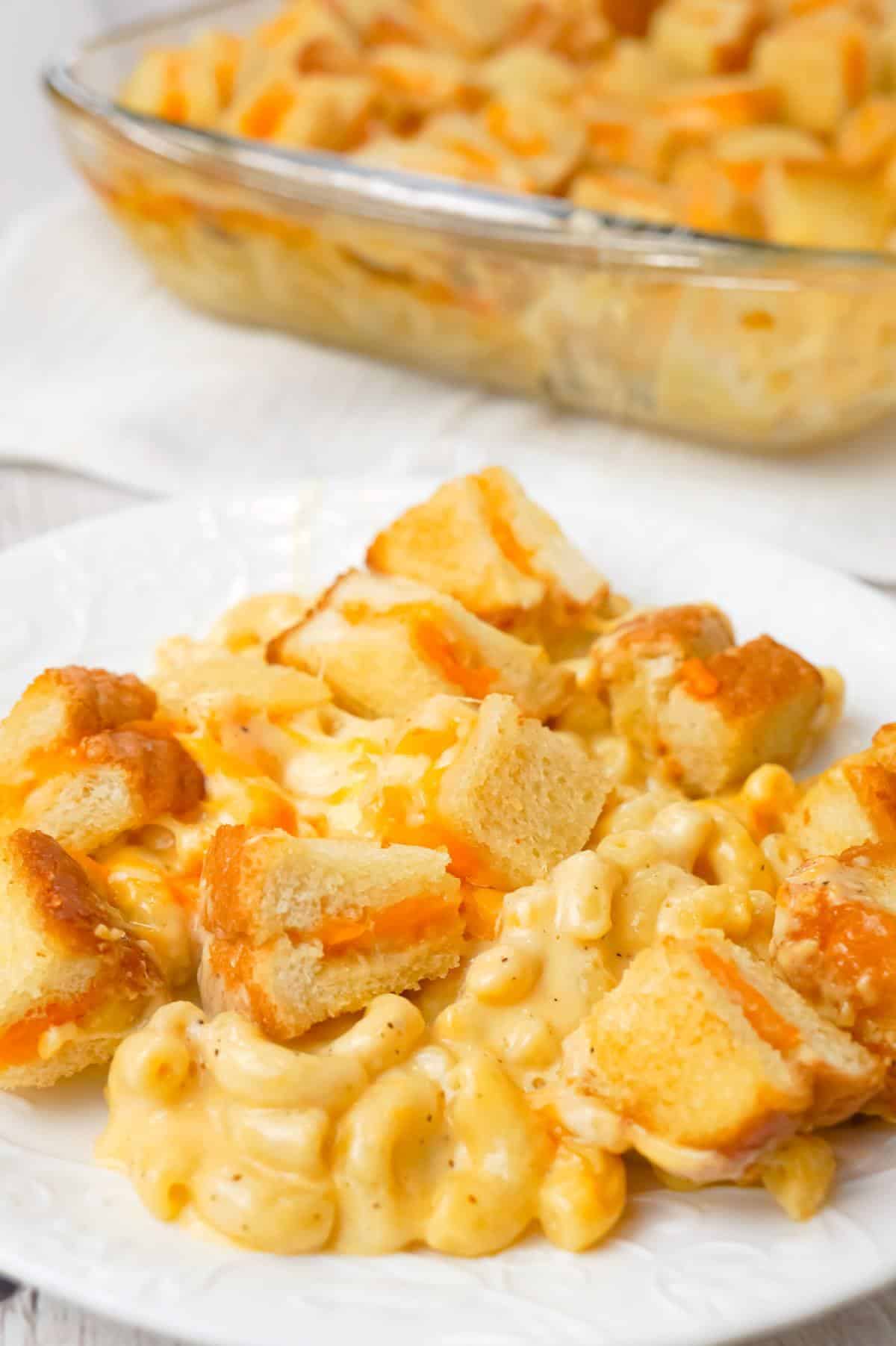 Grilled Cheese Mac and Cheese is a delicious baked macaroni and cheese recipe topped with bite sized pieces of grilled cheese sandwiches.