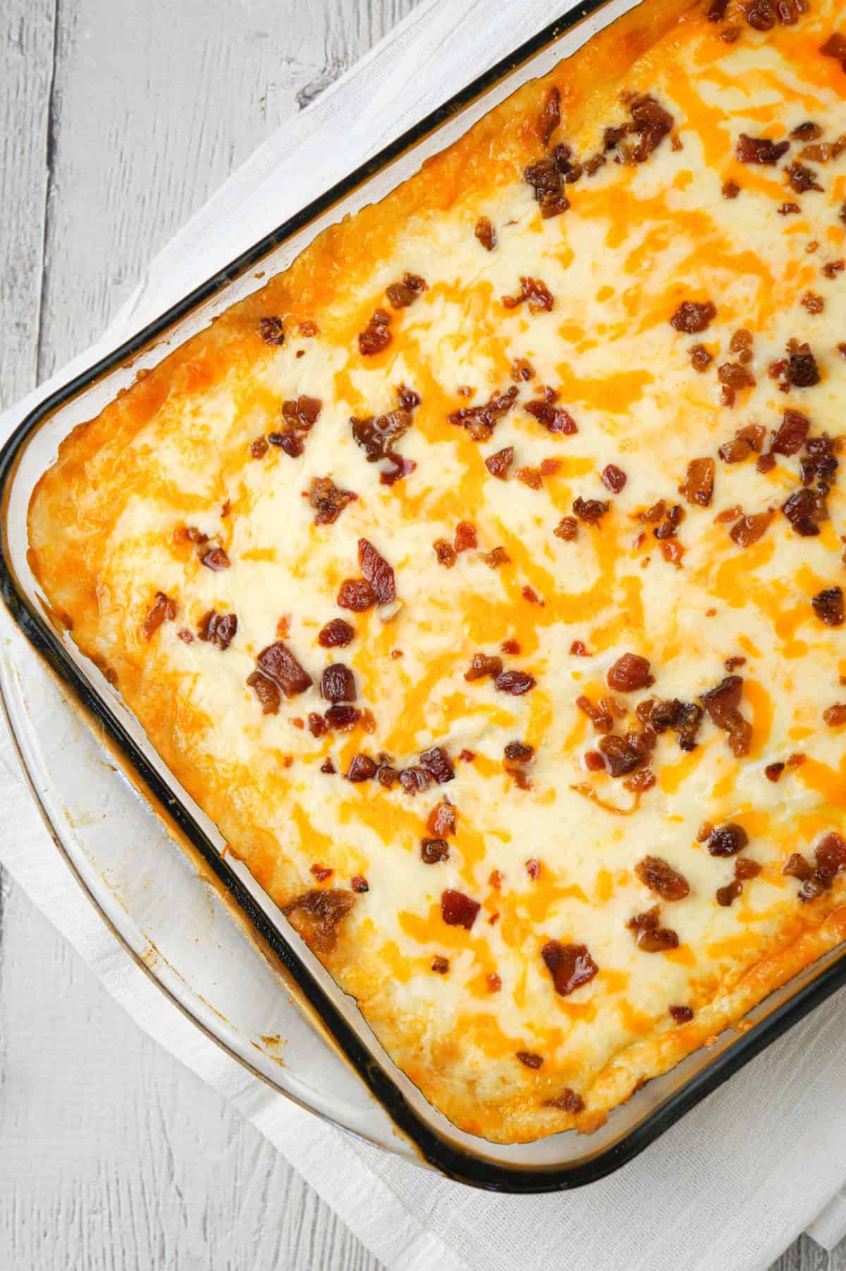 Bacon Cheeseburger Shepherd's Pie is an easy ground beef dinner recipe loaded with crumbled bacon, creamy mashed potatoes and shredded cheese.