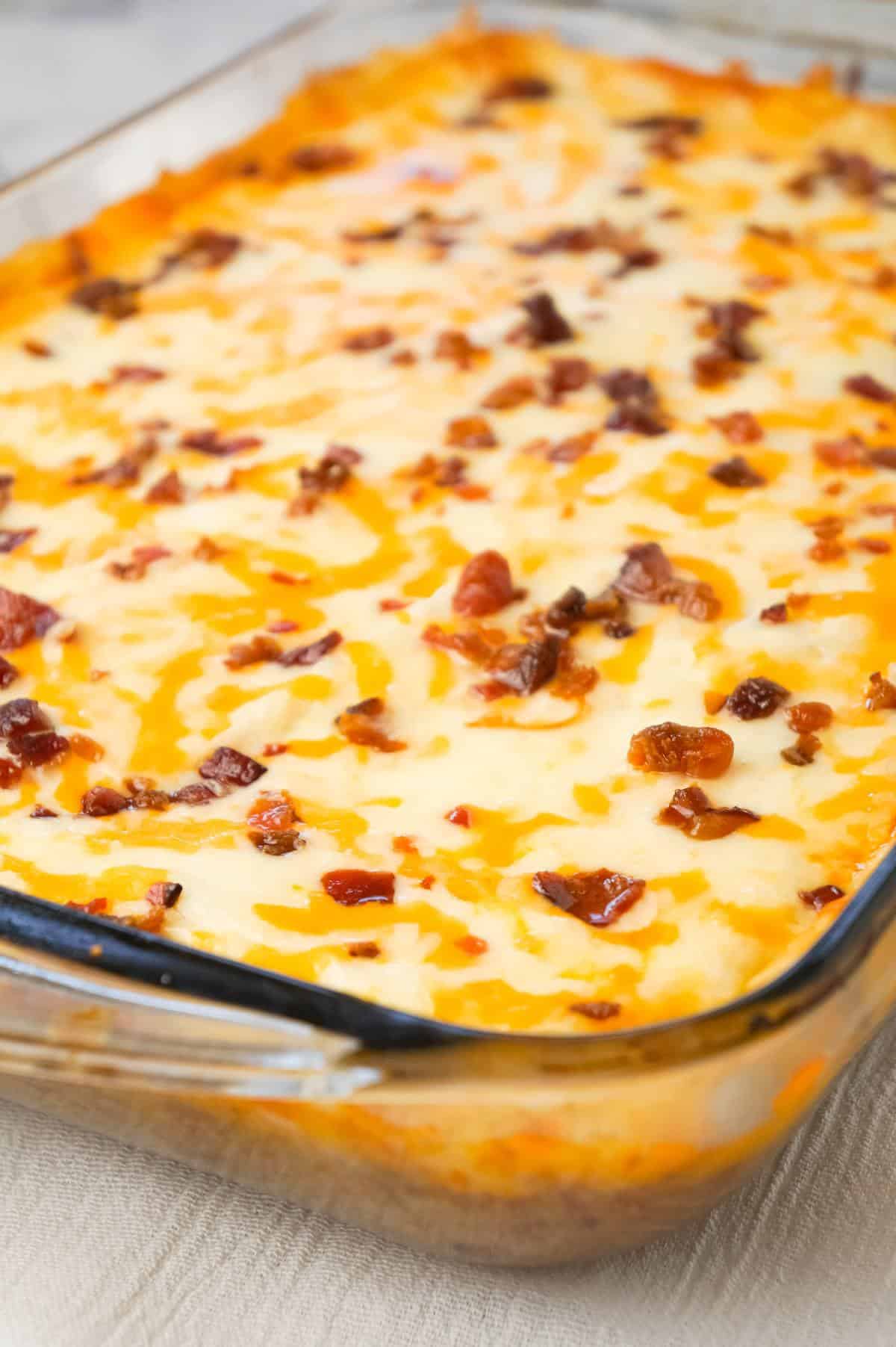 Bacon Cheeseburger Shepherd's Pie is an easy ground beef dinner recipe loaded with crumbled bacon, creamy mashed potatoes and shredded cheese.