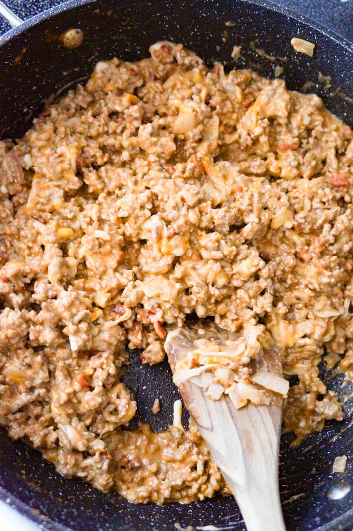 cheesy ground beef mixture in a saute pan