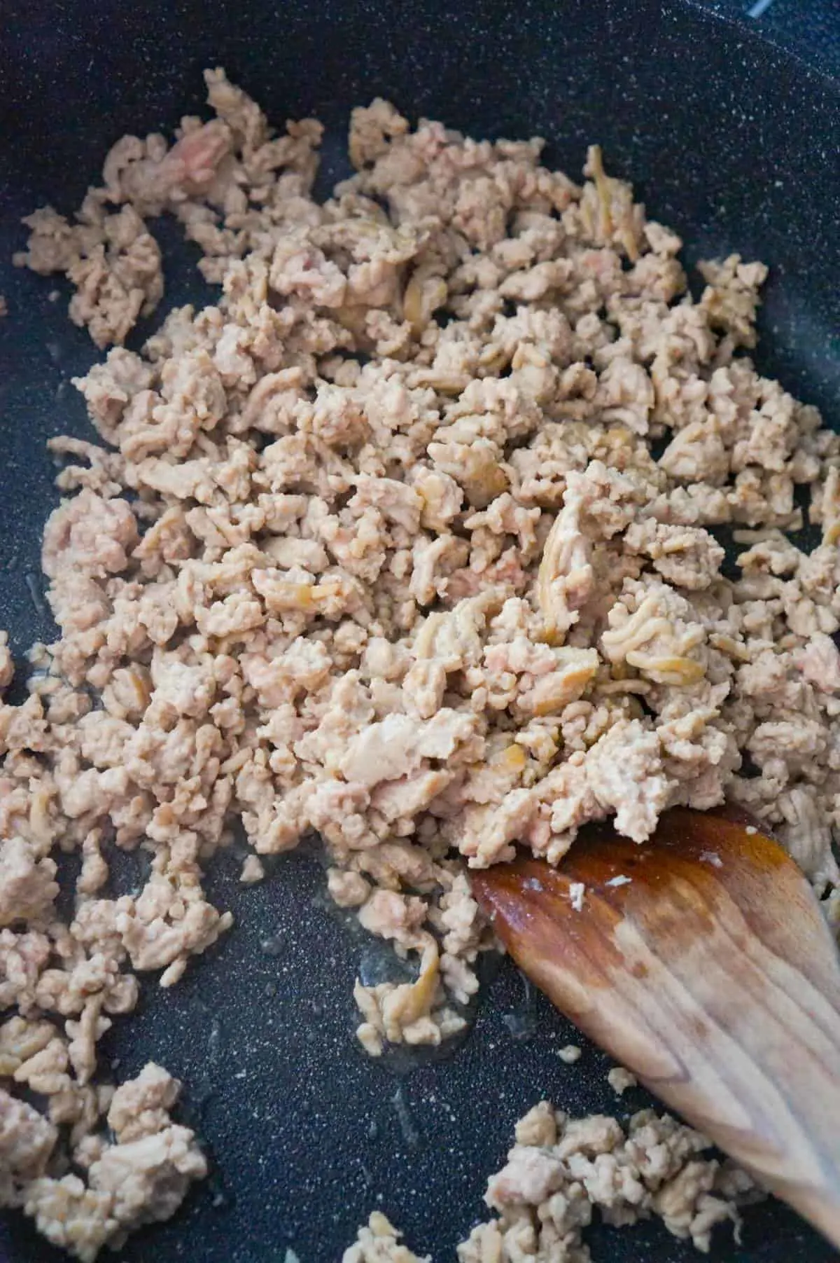 cooked ground chicken in a saute pan