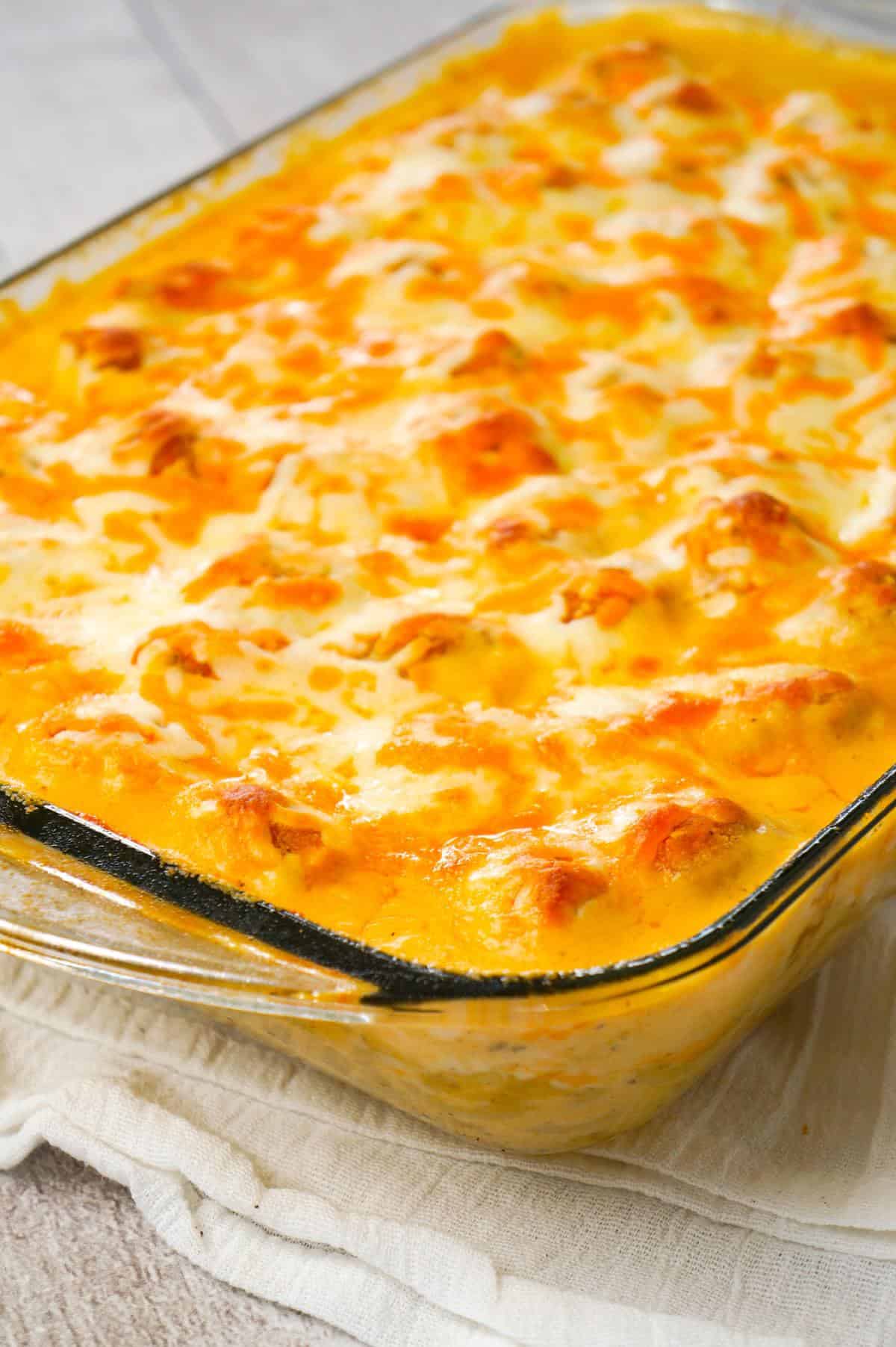 Buffalo Chicken Mac and Cheese is a baked pasta recipe loaded with crispy popcorn chicken, Buffalo sauce, ranch dressing, cheddar and mozzarella cheese.