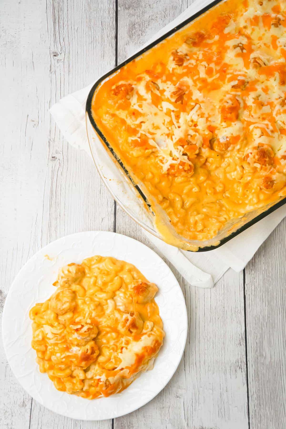 Buffalo Chicken Mac and Cheese is a baked pasta recipe loaded with crispy popcorn chicken, Buffalo sauce, ranch dressing, cheddar and mozzarella cheese.