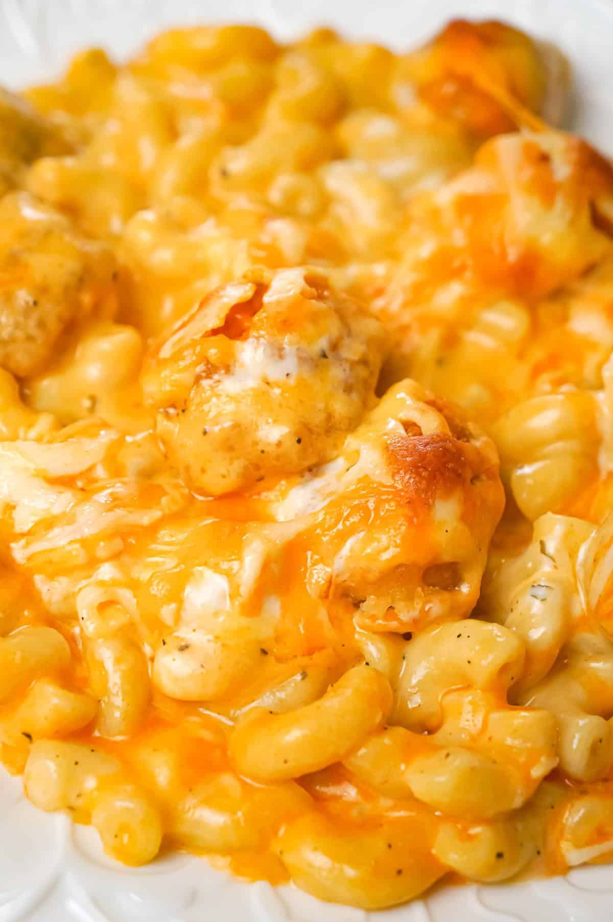 Buffalo Chicken Mac and Cheese is a baked pasta recipe loaded with crispy popcorn chicken, Buffalo sauce, ranch dressing, cheddar and mozzarella cheese.