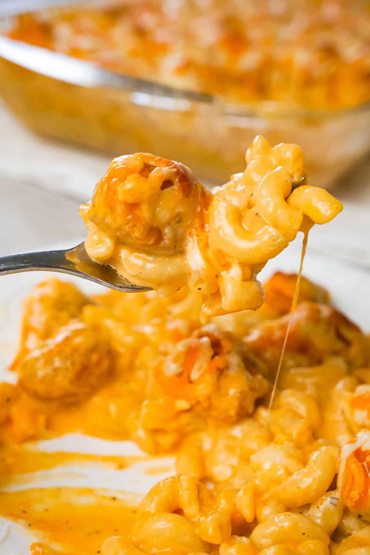 Buffalo Chicken Mac and Cheese is a baked pasta recipe loaded with crispy popcorn chicken, Buffalo sauce, ranch dressing, cheddar and mozzarella cheese.