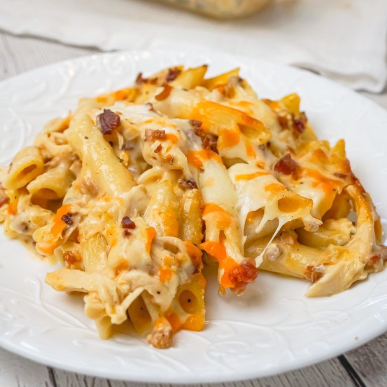 Cheddar Bacon Ranch Chicken Pasta is a delicious baked pasta recipe loaded with crumbled bacon, shredded chicken and cheddar cheese all in a creamy sauce made with cheddar cheese soup, cream of bacon soup and ranch dip mix.