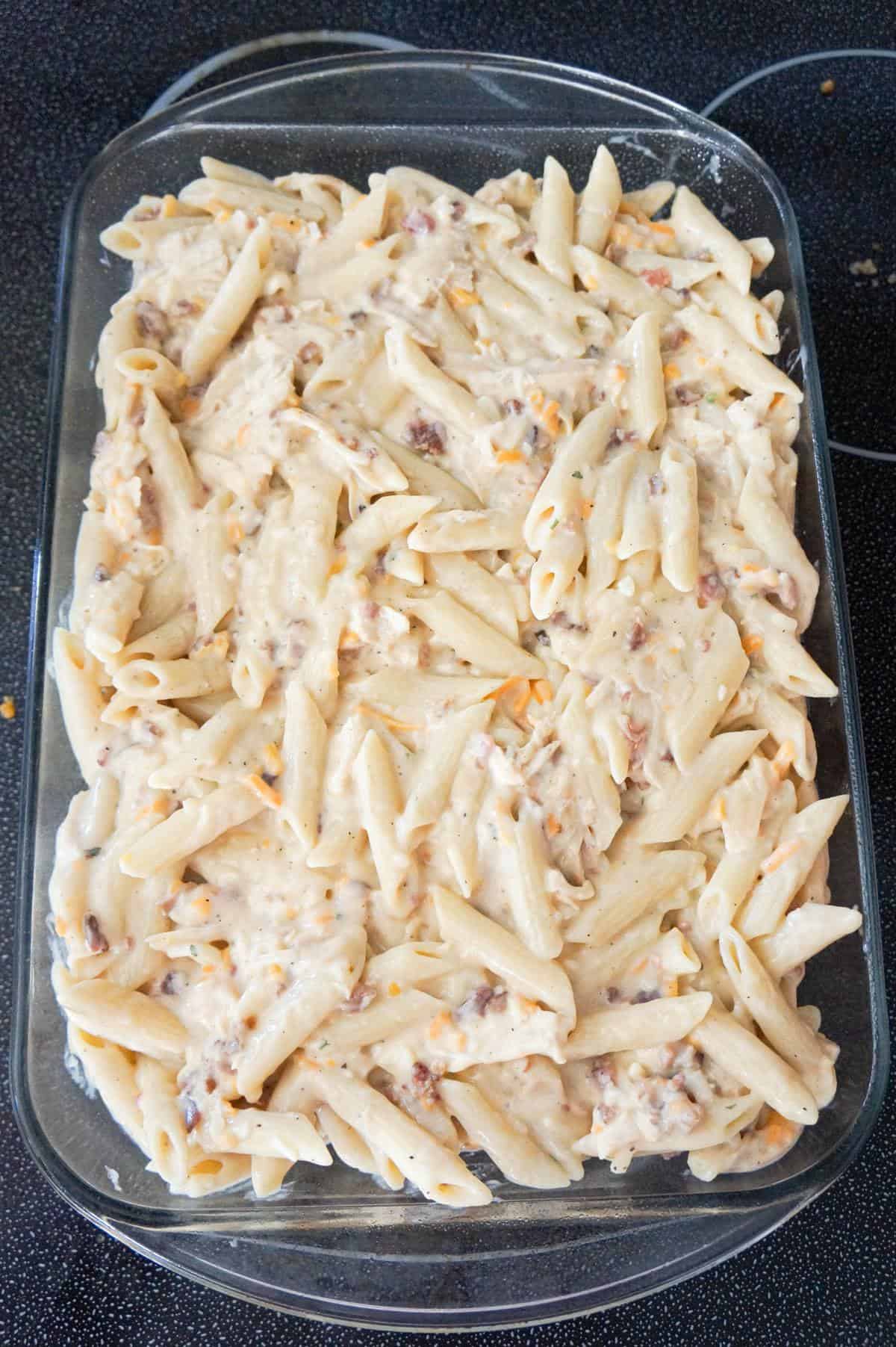 creamy chicken penne in a baking dish