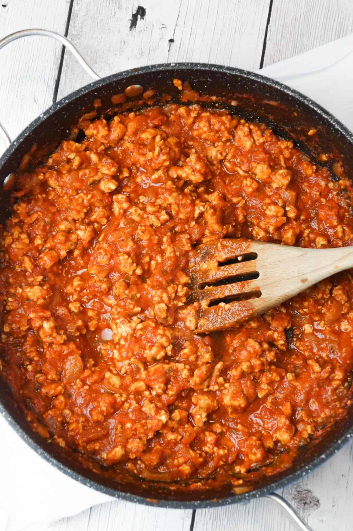 ground chicken sloppy joe mixture in a saute pan