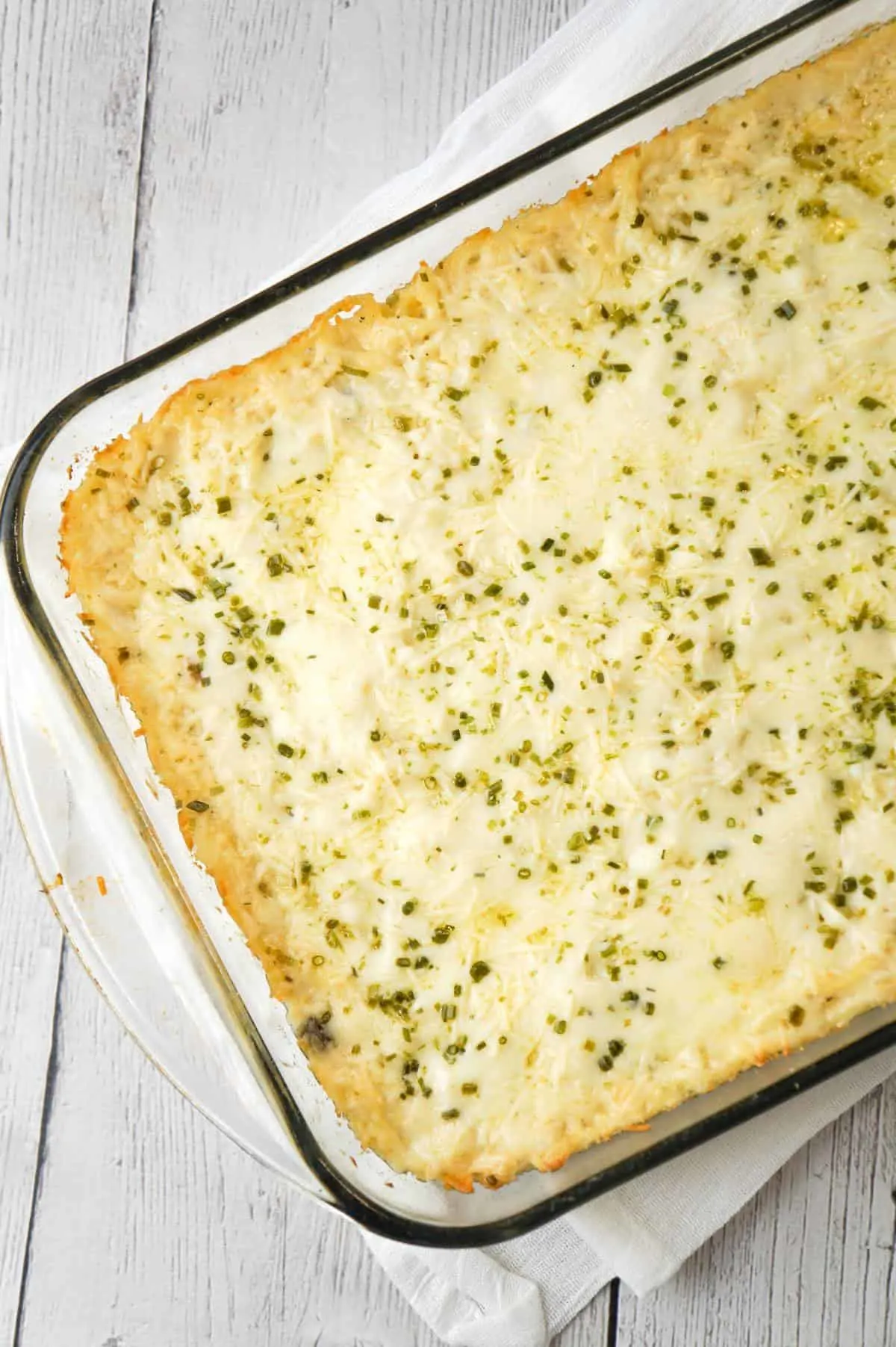 Chicken Tetrazzini is a creamy baked pasta dish loaded with shredded chicken, Parmesan and Mozzarella cheese.