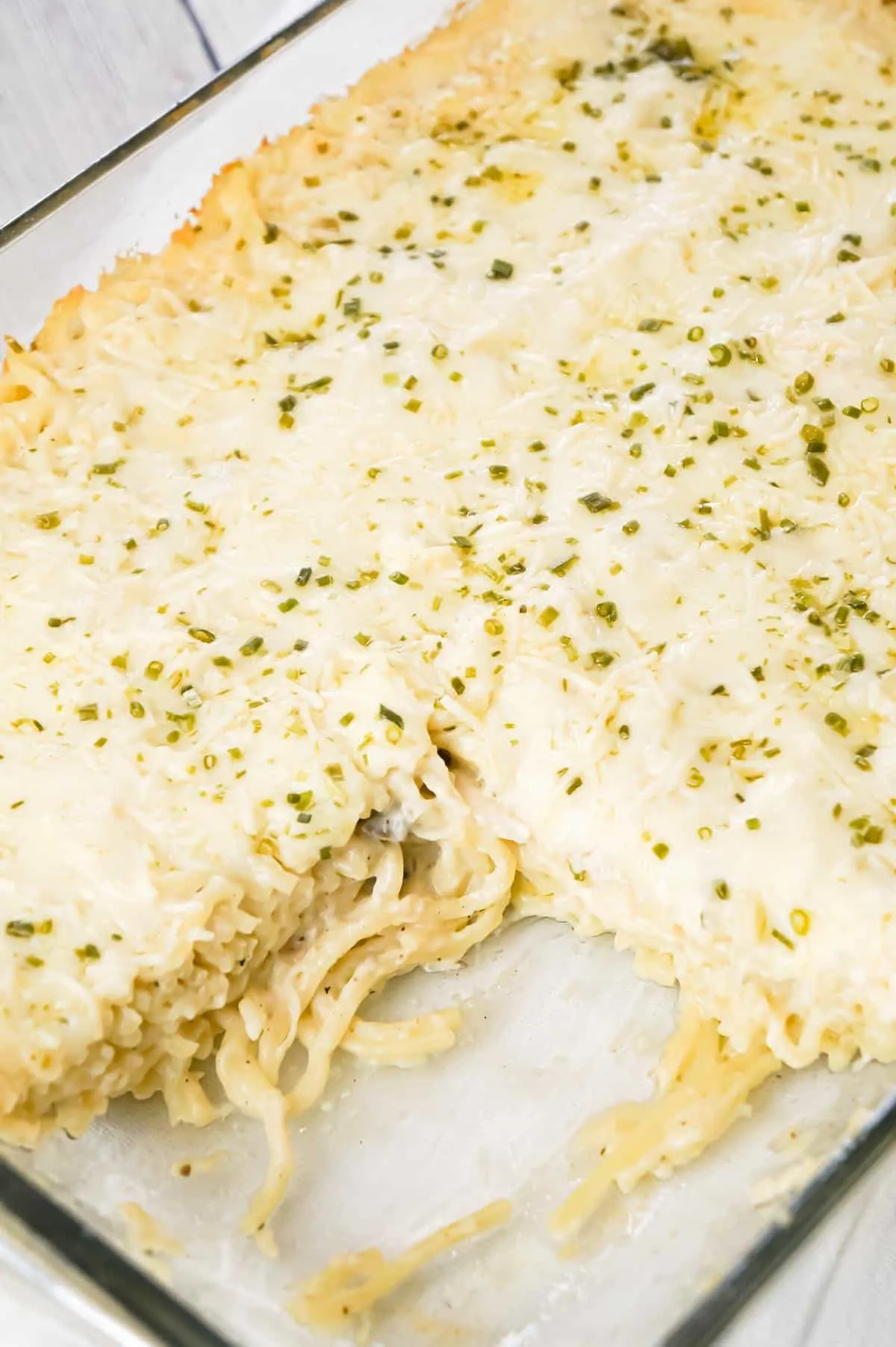 Chicken Tetrazzini is a creamy baked pasta dish loaded with shredded chicken, Parmesan and Mozzarella cheese.