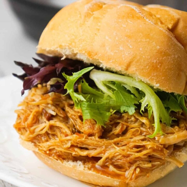 Instant Pot Honey Garlic Chicken Sandwiches are an easy pressure cooker chicken dinner recipe using boneless, skinless chicken breasts cooked in a homemade honey garlic sauce.